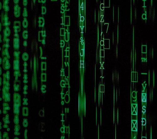 Schwarzer Hintergund mit grüner Code Matrix